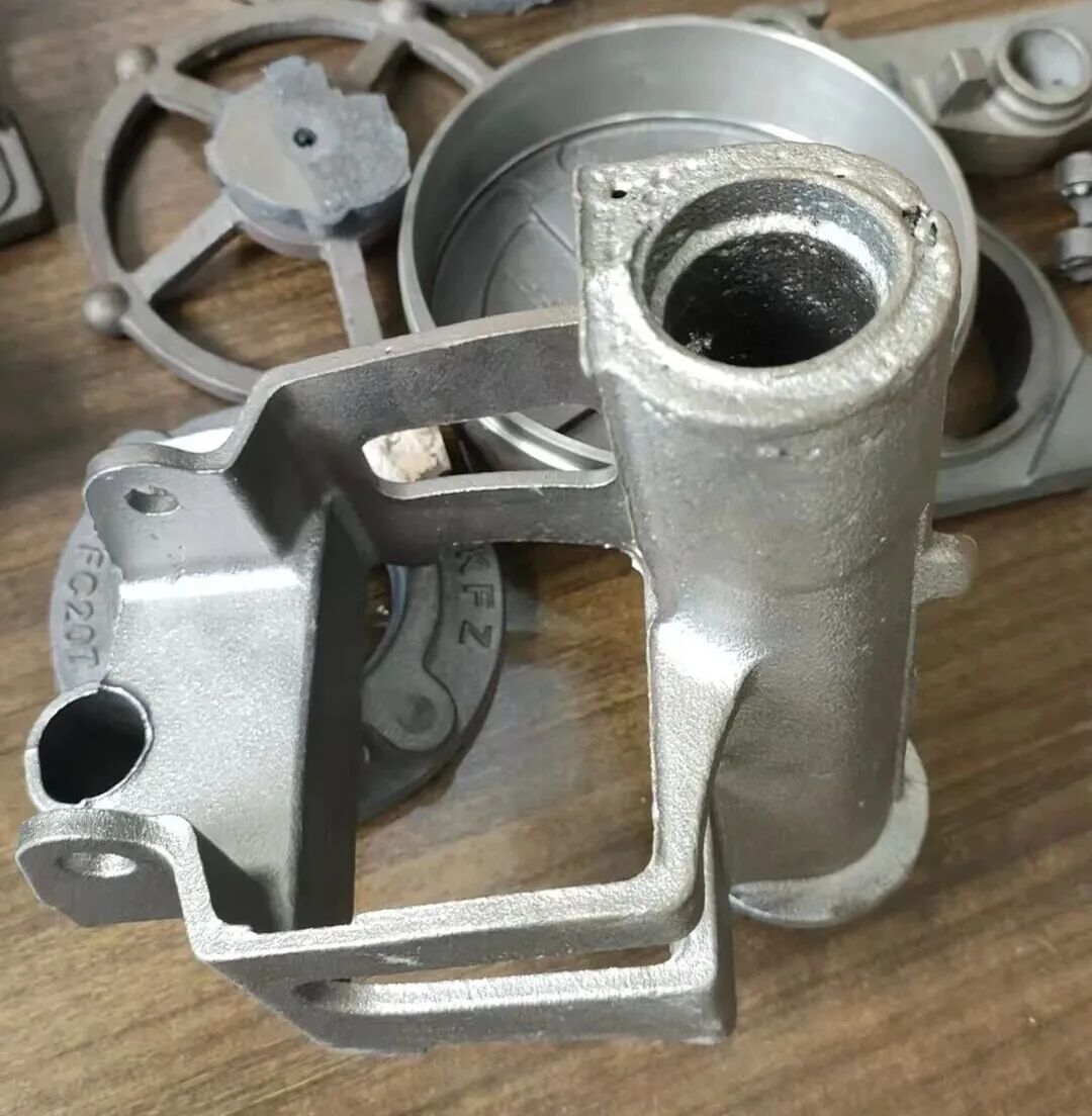 Обробка сильної пористості в циліндричних трубчастих піщаних сердечниках під час виробництва частин із ковкого чавуну за технологією формування із зеленого піску